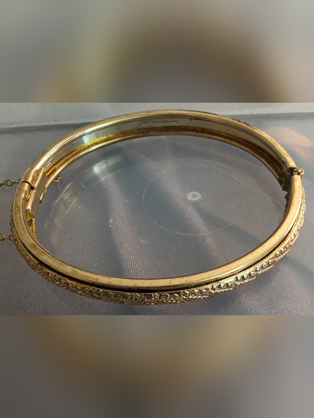 WHITING & DAVIS Vintage Victorian Revival gold-tone hinged bangle bracelet.